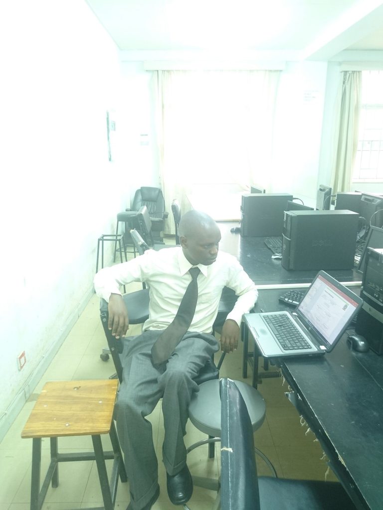 Offices Refresh Laptop Fleets to Support Hybrid Teams office workers working on laptops at their desks